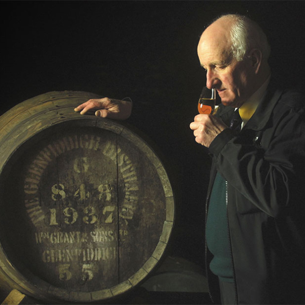 Man testing aroma of cask